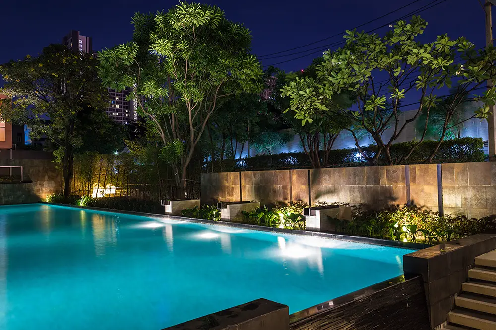 Lighting for luxury backyard swimming pool.