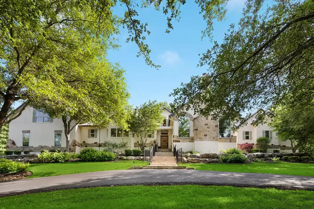 beautiful lawn in front of large home